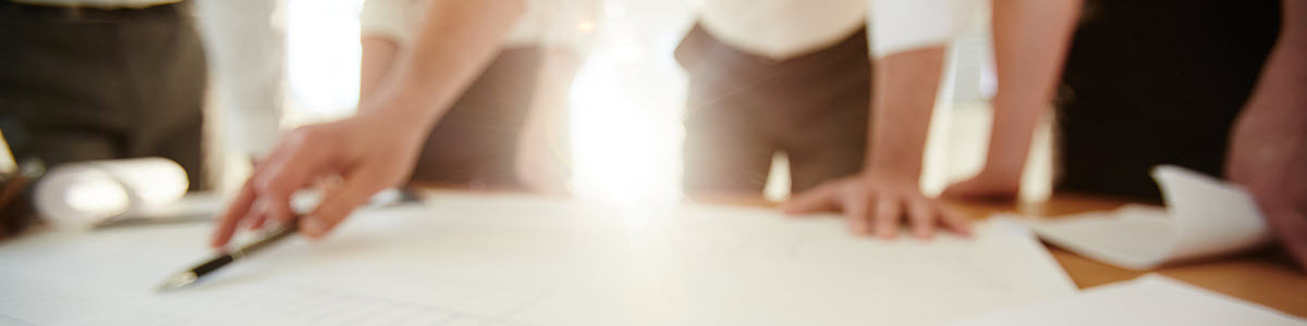 hand pointing to a table